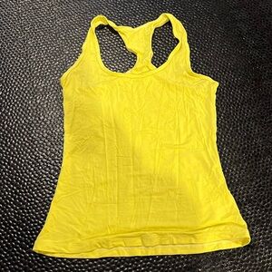 Bright yellow halter back tank